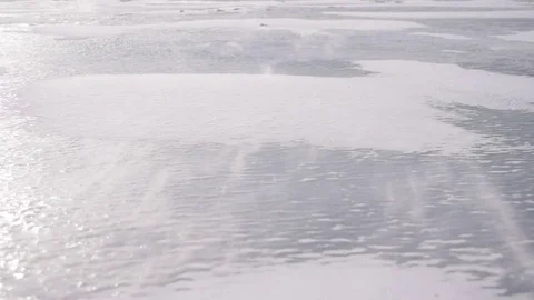 Drift snow blown by heavy wind on ice Video stock 73240720