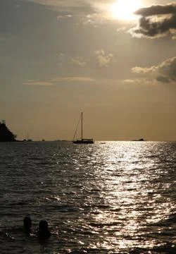 Drifting boat on a sunset Foto stock