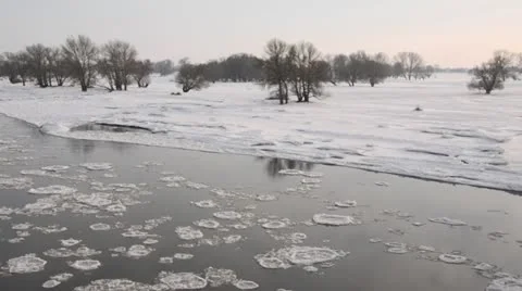 Drifting ice on Elbe River, Flusslandschaft Elbe Biosphere Reserve, Germany Stock Footage 12676437