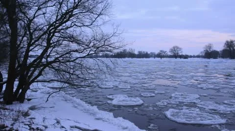 Drifting ice on Elbe River, Flusslandschaft Elbe Biosphere Reserve, Germany Stock Footage 12676602