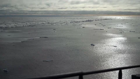 Drifting ice on water. View from side of moving vessel. Small pieces of ice. Stock Footage 194517664