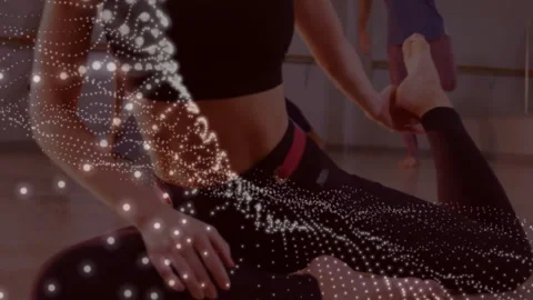 Drifting light particles initiating quad stretching by kneeling woman against Видео 313570938