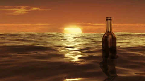 Drifting message in the bottle from right to left at sunset. Stock Footage 47900459