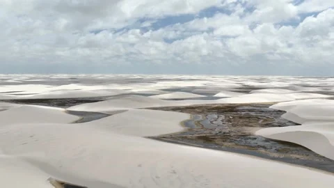 Drifting Over Branching Water Channels and White Dunes at Lençóis Maranhenses Stock-Footage 342445265