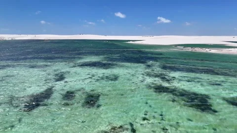 Drifting Over Emerald Lagoons and White Dune Ridges Stock Footage 342444286
