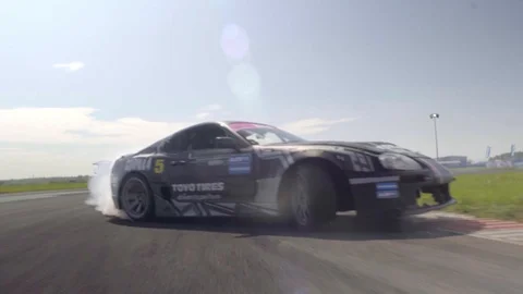 Drifting Race Car Burnout With Lots Of Smoke Stock Footage