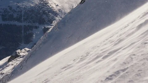 Drifting snow on the slopes of high mountains Stock Footage 82744649