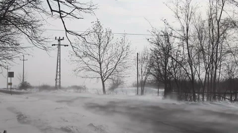 Drifting snow on winter road Stock Footage 48389574