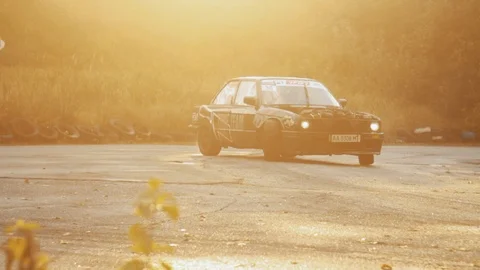 Drifting training and burning tires on track with powerful car Stock Footage 98230126