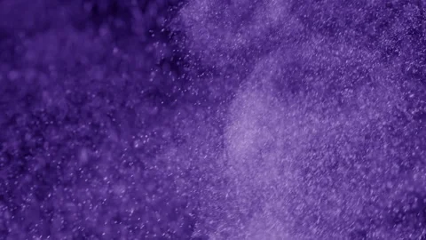 Drifting violet dust cloud on dark background Stock Footage 340004589