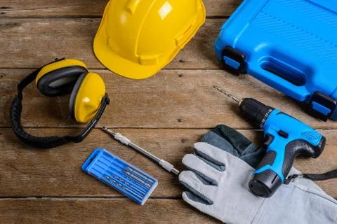 Drill and set of drill,tools,carpenter and safety, Protection Equipment Stock Photos
