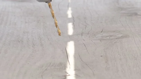 Drill is approaching to a wooden surface boards,planks 動画素材 201943826