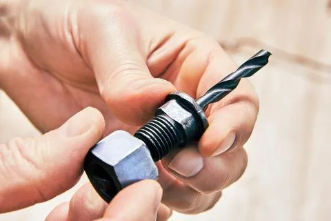 Drill bit attachment for lock installation, designed for use with hole saw .. Foto stock