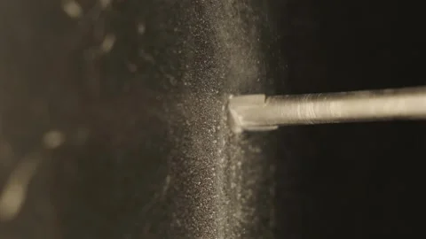 Drill bit drilling into ceramic tile. Drill bit rotating in slow motion Stock Footage 247062189