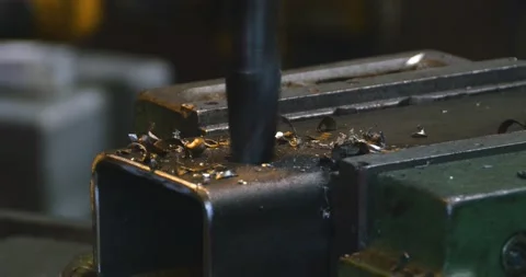 Drill bit drilling through metal  Stock Footage 137442530
