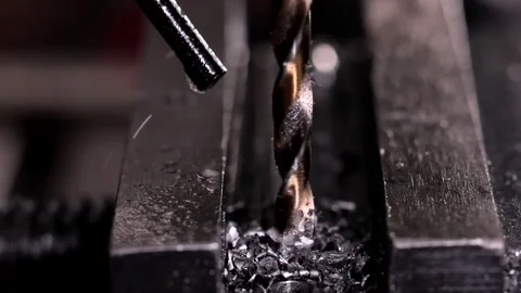 Drill bit secured in the drilling machine rotates in slow motion Stock Footage 304767853