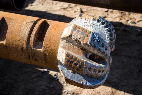 Drill bit. Tool for deep drilling. Stock Photos