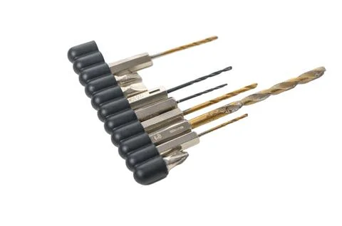 Drill bits and screwdriver bits isolated on white background Stock Photos