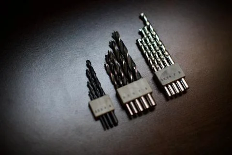 Drill bits and thickness numbers Stock Photos