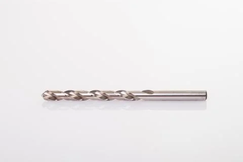 Drill bits, isolated on white background close-up Stock Photos