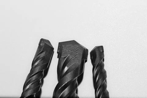 Drill bits for perforator close-up on a white background Stock Photos