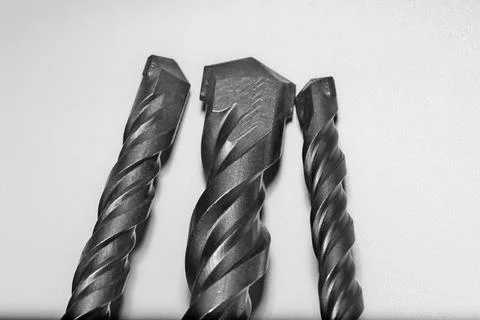 Drill bits for perforator close-up on a white background Stock Photos