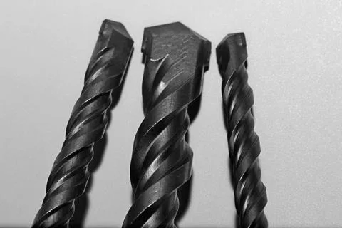 Drill bits for perforator close-up on a white background Stock Photos
