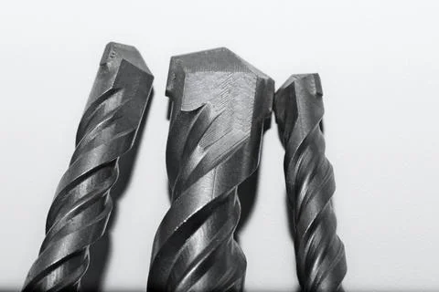 Drill bits for perforator close-up on a white background Stock Photos