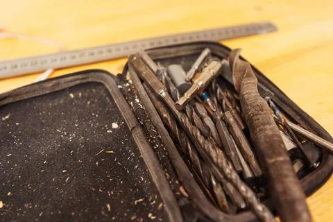 Drill bits repair work in open case close up Stock Photos