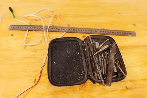 Drill bits repair work in open case close up Stock Photos