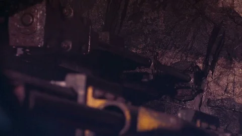 A drill is boring rocks in the mine Stock Footage 72646692