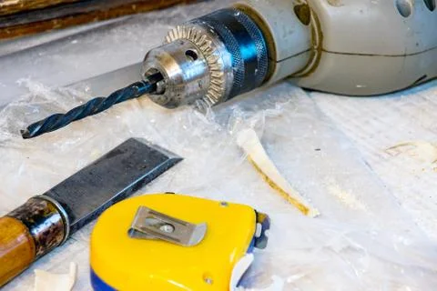 Drill, chisel, measuring tape Stock-Fotos