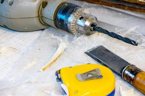 Drill, chisel, measuring tape Stock-Fotos