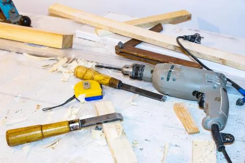 Drill, chisel, measuring tape Stock Photos