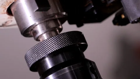 Drill Chuck Slowing Down and Stopping on an Industrial Drilling Machine Stock Footage 304767270