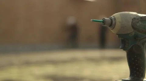 Drill with construction site in background Stock Footage 21556445