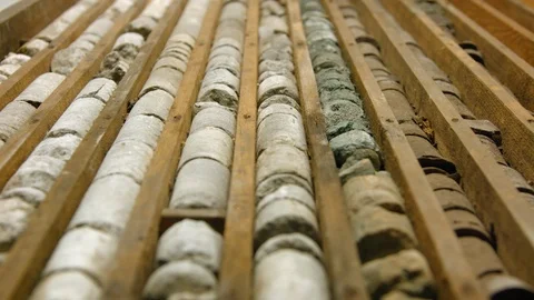 Drill core samples from geological borehole in wooden box Video stock 123610951