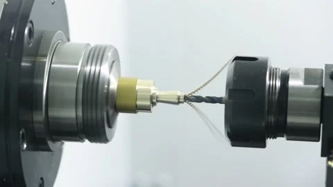 Drill cutting tool at metal working on cnc lather machine Stock Footage 131398908