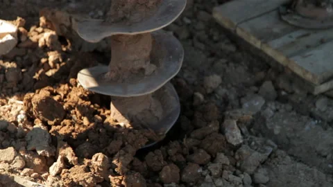 Drill is digging a hole.Close-up. Stock Footage 132261691