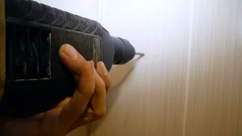 Drill drills a hole in the tile. Stock Footage 122375526