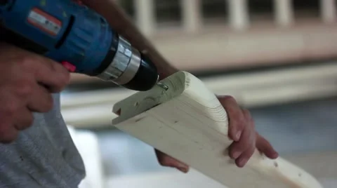 A drill drills holes Stock Footage 66445855