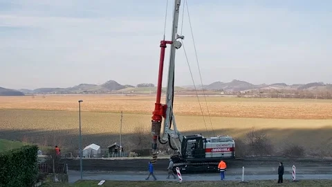 Drill into the earth with big machine 03 Stock Footage 133842515