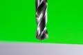 The drill on the green background Photo