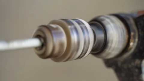 Drill Head Spinning On Gray Background Stock Footage 129328625