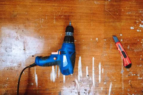 Drill lies on the table Stock Photos