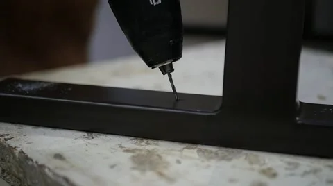 A drill to make a hole Stock Footage 69021997