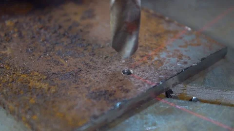Drill makes hole in metal workpiece Stock Footage 118253228