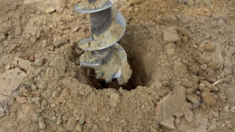 A drill for making holes in the ground. Stock Footage 308594357