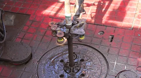 Drill pipe and rig tong on the rig floor while being made up for drilling Stock Footage 52898024