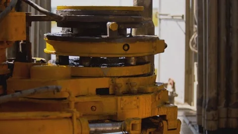 Drill pipe and rig tong on the rig floor while making up for drilling Stock Footage 82755703